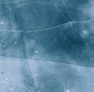 background image - top down view of blue ice cracks