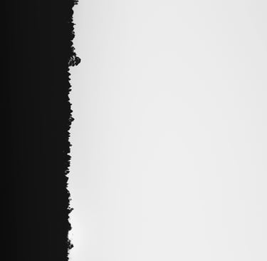 background image - contrasty black and white image of land and sky