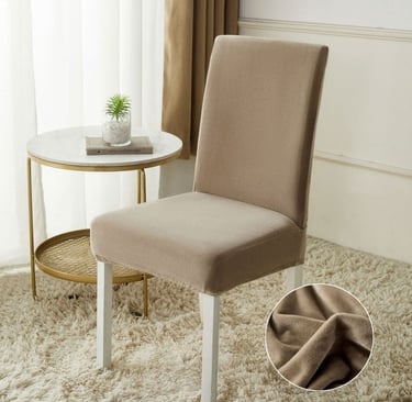 a chair with a chair and a table with a plant in it