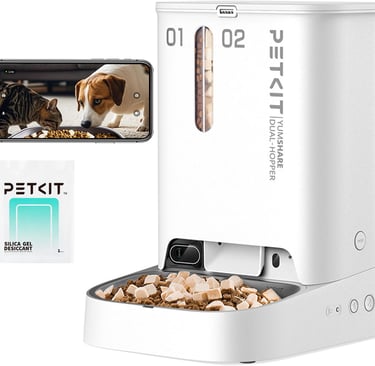 a dog is eating food out of a pet bowl