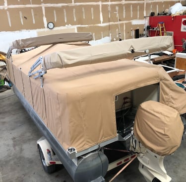 Snap down pontoon boat cover with cutouts for Bimini top
