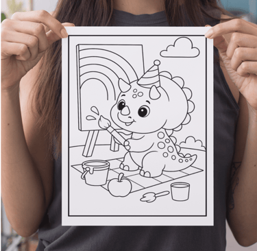 a woman holding up a drawing of a baby dragon