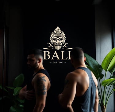 a man with tattoos on his chest and a tattoo on his chest