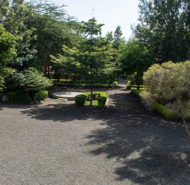 Tumaini House School - green assembly ground