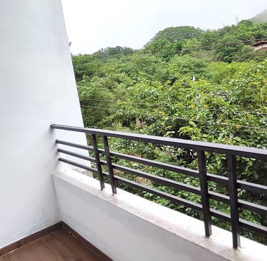Lakefield apartment balcony with panoramic view of Igatpuri hills