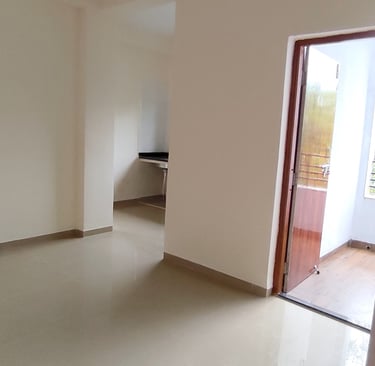 Spacious living room at Lakefield Apartments with modern interiors at Igatpuri