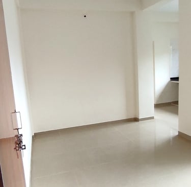 Spacious living room at Lakefield Apartments with modern interiors in Igatpuri