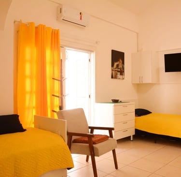 Quarto Com Duas Camas e Ar Condicionado