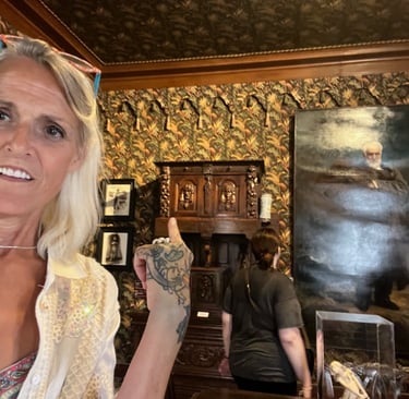 a woman with tattoos on her arm and a man in a white shirt