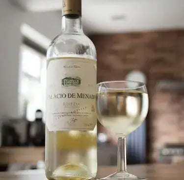 a BOTTLE of wine and a glass of wine