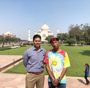 With Mr. Pharrell Williams, American singer and musician from the U.S.