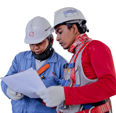 Engineers reviewing site drawings