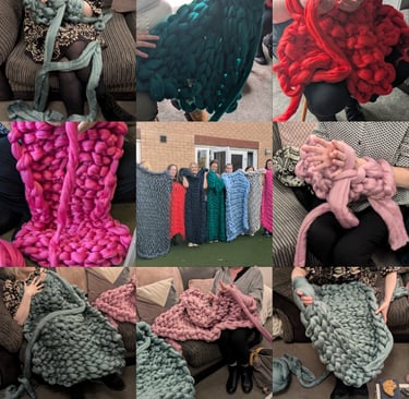 groups arm knitting blankets during previous workshops