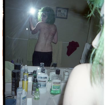 Mirror self-portrait in my childhood bathroom.