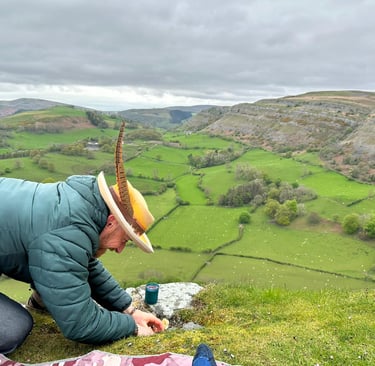 Rijusiddha making offerings at the top of Castell Bran