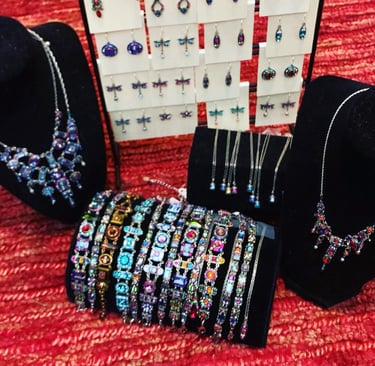 a display of jewelry and jewelry on display