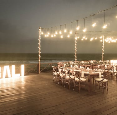 a large table with a ball of lights on it