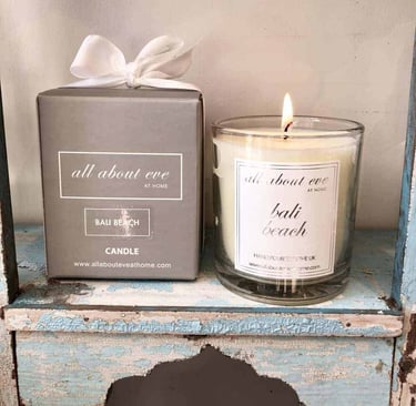 a candle that is sitting on a shelf