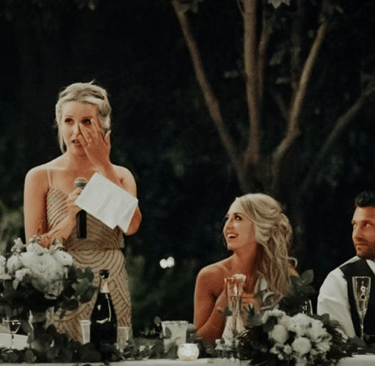 a woman in a dress and a man in a suit and tie