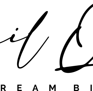 Ismail Qadry minimalist signature logo with the slogan Dream Big in black cursive font.