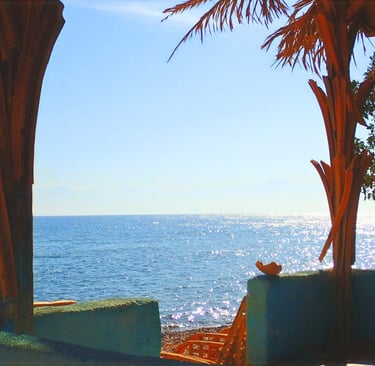 Watching the sea from our popular bungalow with shared bathroom first line