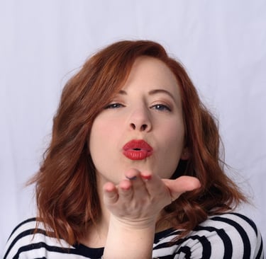 Single empty nester blowing a kiss to other empty nesters