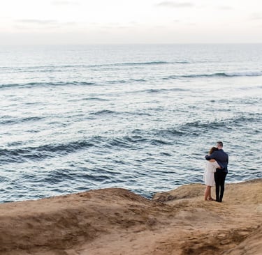 Two empty nesters overlooking the ocean