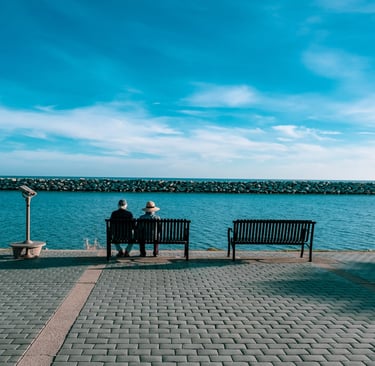 Couple on a Bench Staring Over Water