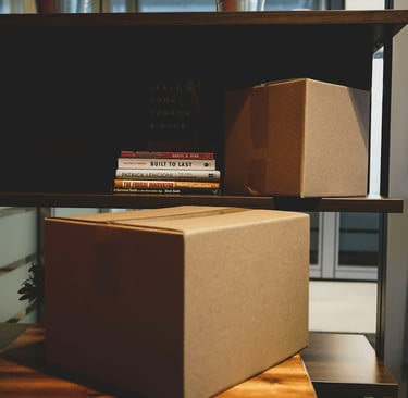 Packing Boxes Stacked on a Shelf