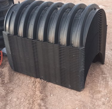 Infiltrator's Safety Star riser and a stack of chambers by red Dirt Ditching and Septic LLC Lubbock.