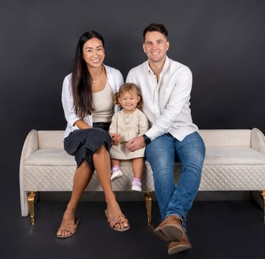 Tender family embrace captured in a timeless portrait, celebrating love and togetherness.