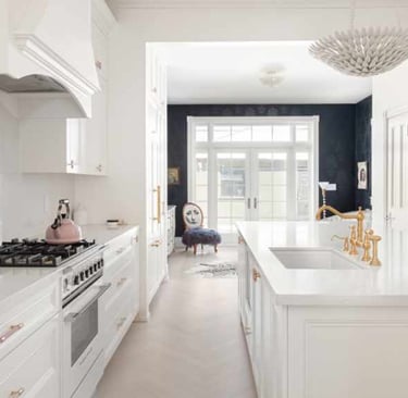 a kitchen with a white counter top and a white counter top