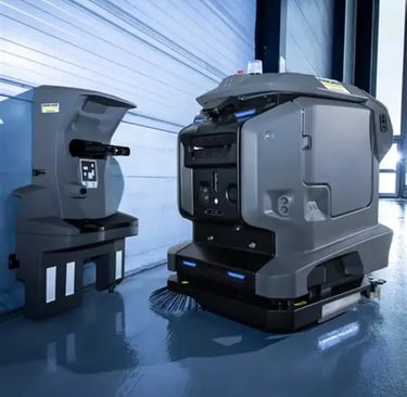 Robot autolaveuse autonome en action sur un sol de site industriel — nettoyage BtoB assisté par IA