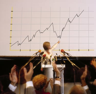 businesswoman pointing at chart representing AI trends 2026