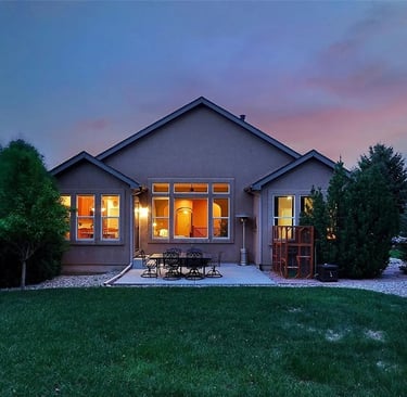 a house and backyard at twilight