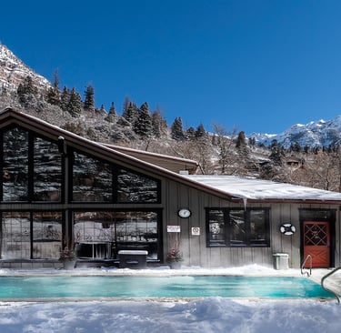 Ouray, CO real estate commercial property branding historic hotel and outdoor pool winter day