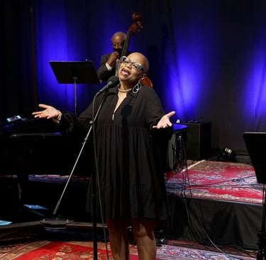 Tiya! performs with her band.