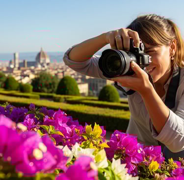 woman taking photo of pink and purple flowers