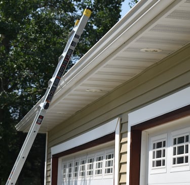 ladder on house during initial roof inspection