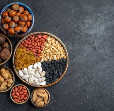 a variety of nuts and nuts in bowls