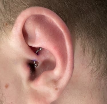 	Safe daith piercing with titanium hoop in Montrose