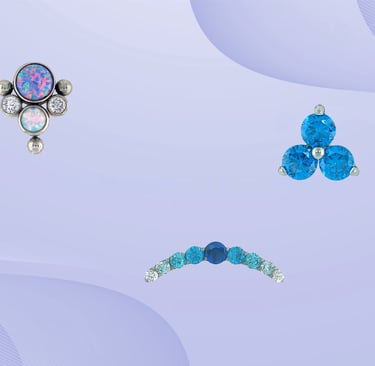 Titanium belly bars and barbells available at Piercing by Jooles