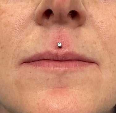 Professional lip piercing in Montrose studio with sterile tools