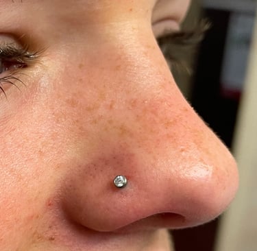 Stylish nose piercing jewellery fitted professionally by Jooles