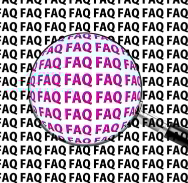 Ein Bild mit einer Lupe für die am häufigsten gestellten Fragen