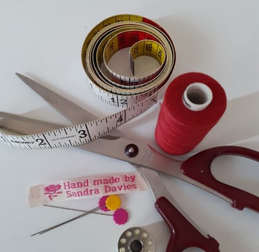 Scissors, tape measure and cotton