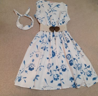 1950's style white dress with blue flower design