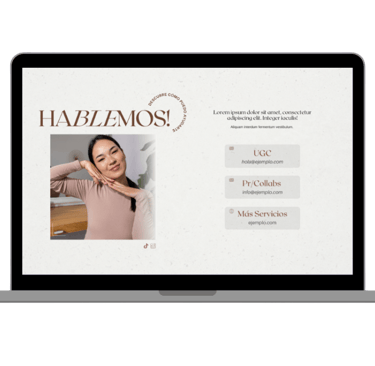 a laptop computer screen displaying a website page with a woman in a pink sweater