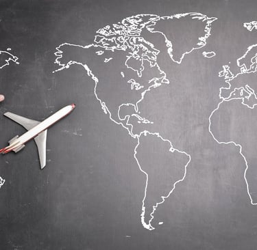 a plane flying over a chalkboard with a plane