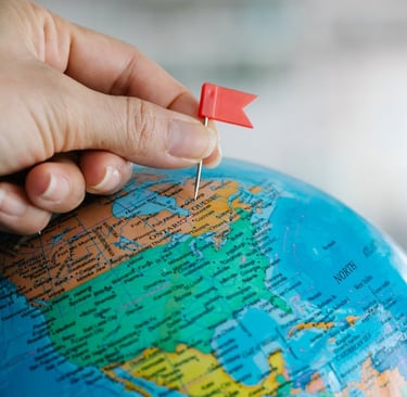 a person's hand holding a pin pinpoint pin pinpoint pinpoint pin